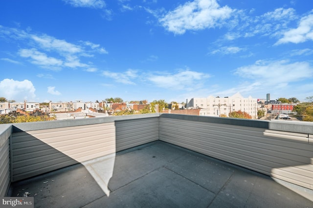 view of patio with a balcony