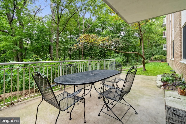 view of patio with a balcony