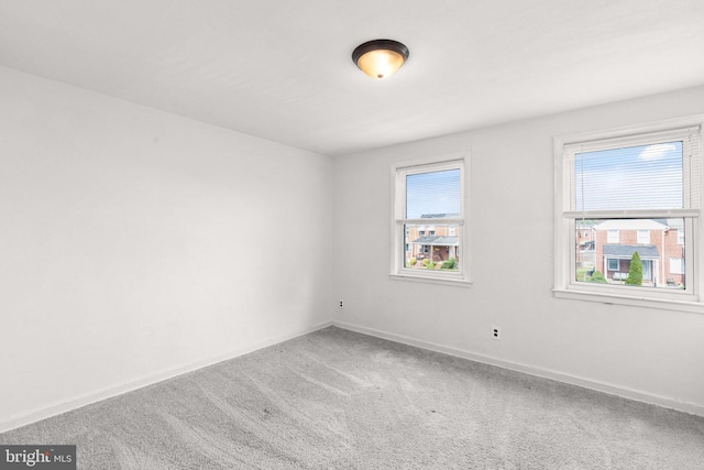 empty room featuring carpet floors