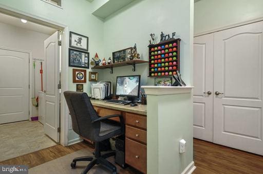 office area with dark wood-type flooring