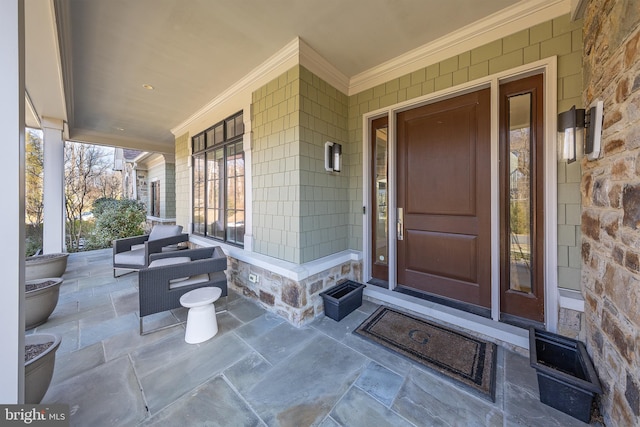 doorway to property with covered porch