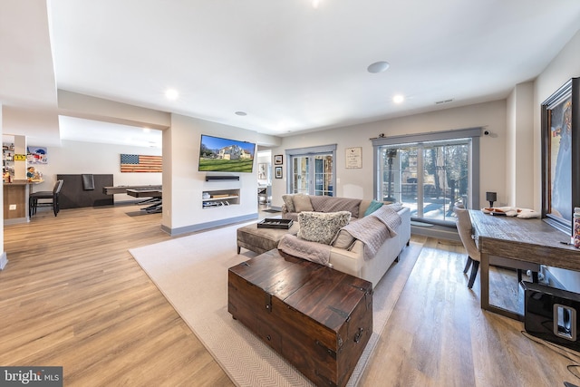 living room featuring light hardwood / wood-style floors