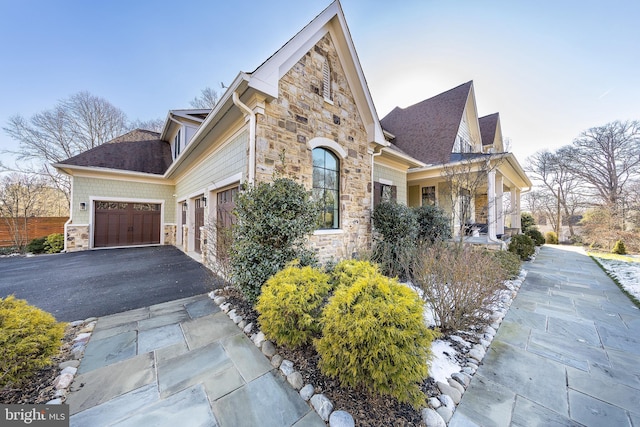 view of property exterior featuring a garage