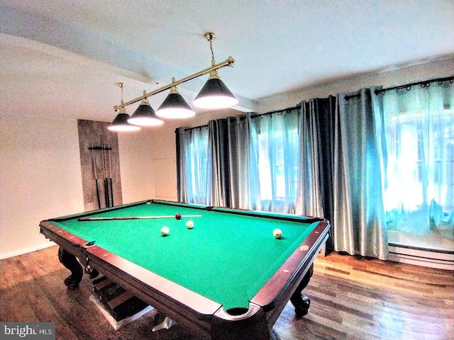 recreation room with a baseboard heating unit, pool table, and hardwood / wood-style flooring