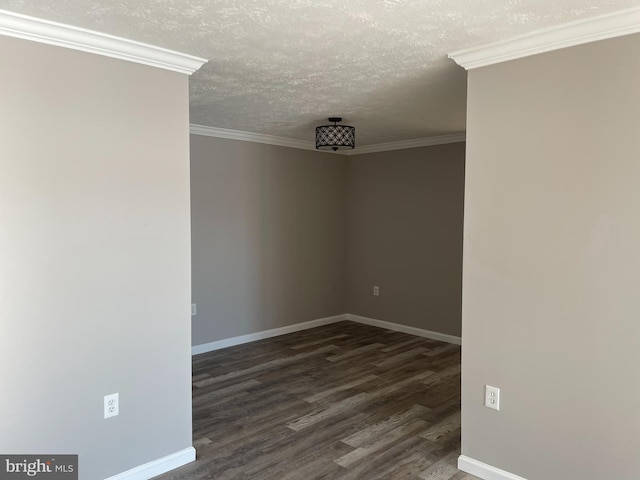 unfurnished room featuring crown molding, dark hardwood / wood-style floors, and a textured ceiling