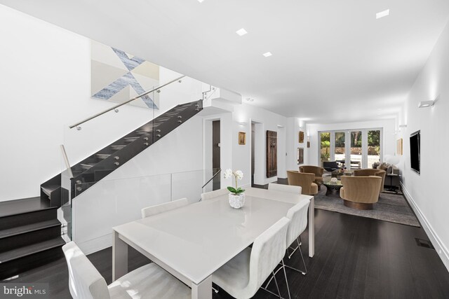 dining area featuring dark hardwood / wood-style floors