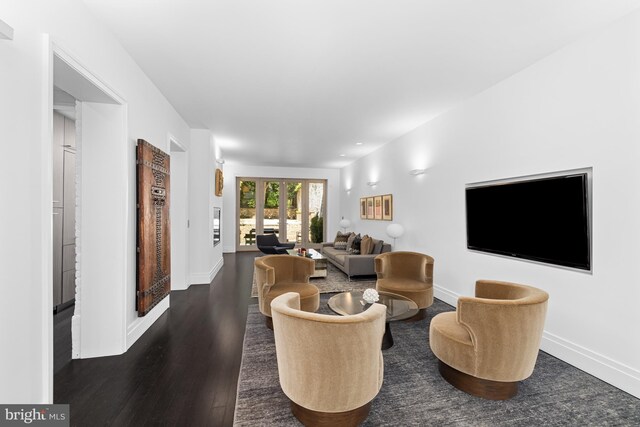 living room featuring dark hardwood / wood-style floors