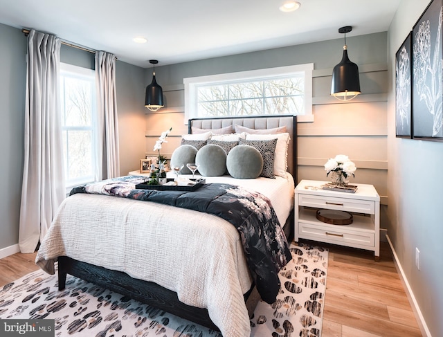 bedroom with light wood-type flooring