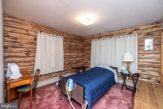 bedroom featuring carpet and log walls