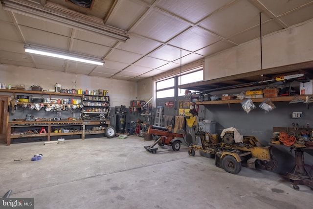 garage with a workshop area