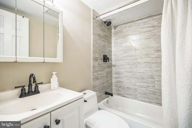 full bathroom with vanity, toilet, and shower / bath combination with curtain