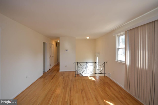 empty room featuring light hardwood / wood-style floors