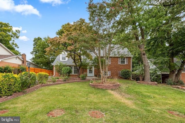 exterior space with a front lawn