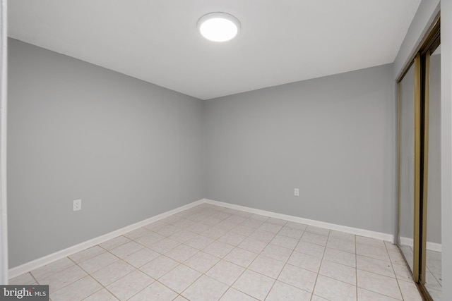 unfurnished bedroom with a closet