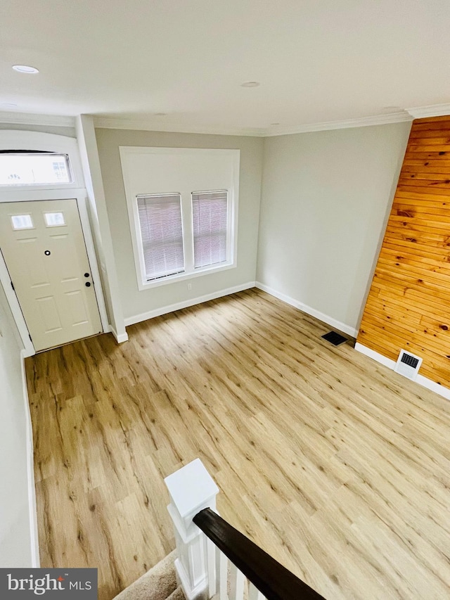 unfurnished living room featuring light hardwood / wood-style floors