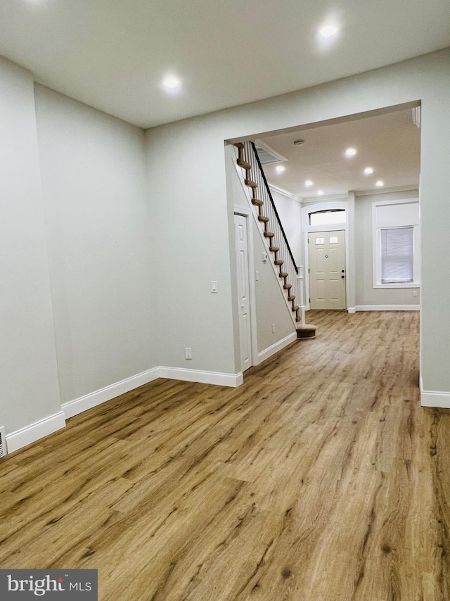 basement featuring light hardwood / wood-style flooring