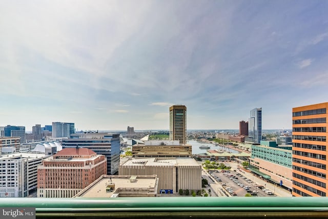 property's view of city featuring a water view