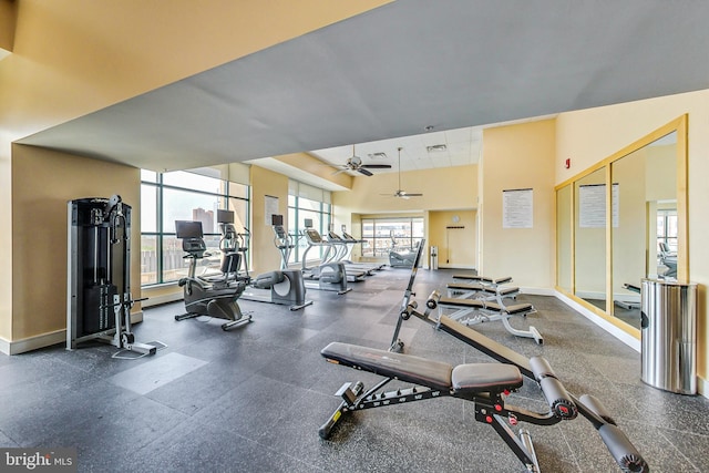 workout area with ceiling fan and a wealth of natural light