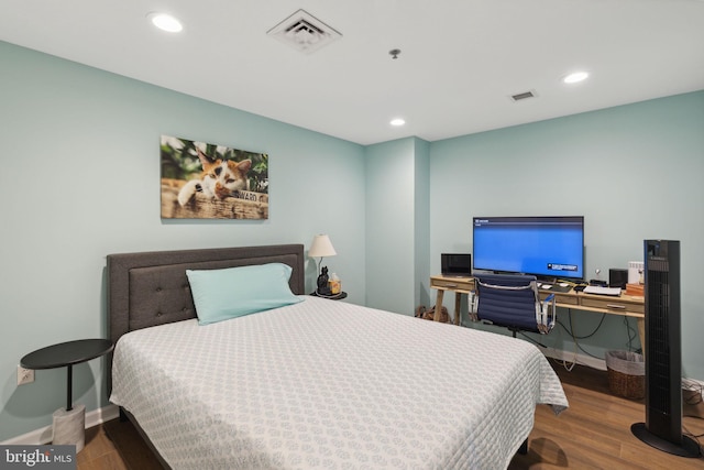 bedroom featuring wood-type flooring