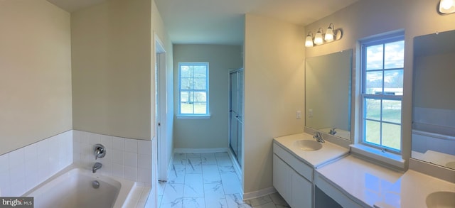 bathroom featuring vanity and plus walk in shower