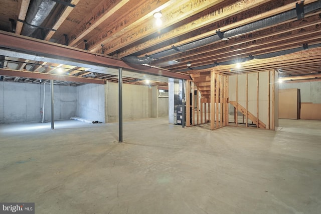 basement featuring heating unit