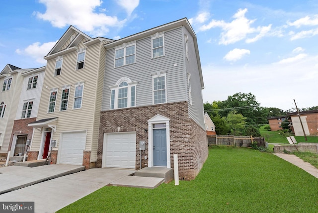 townhome / multi-family property featuring driveway, fence, a front yard, an attached garage, and brick siding