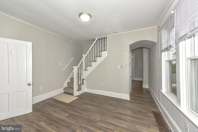 interior space featuring dark wood-type flooring