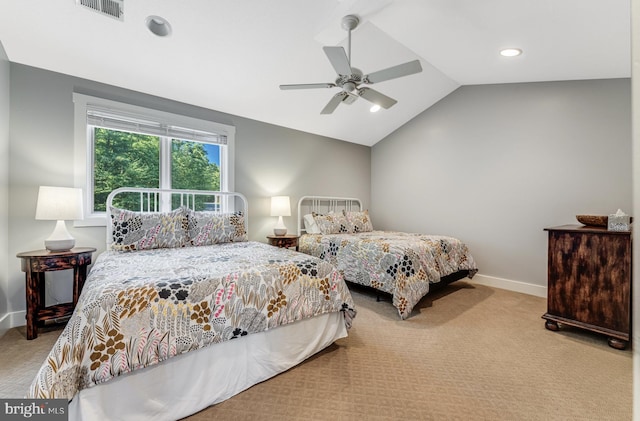 bedroom featuring light colored carpet, ceiling fan, and vaulted ceiling