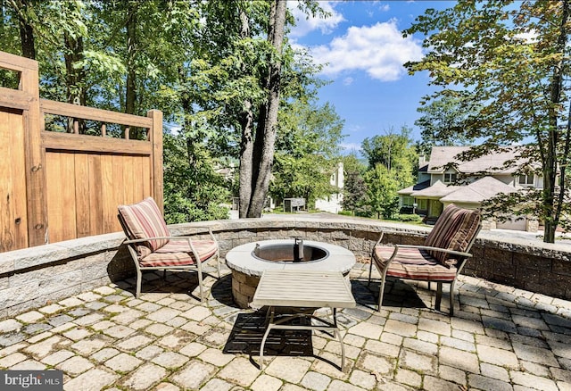 view of patio featuring a fire pit