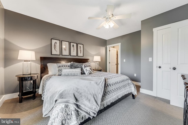 bedroom featuring a closet, ceiling fan, and carpet floors