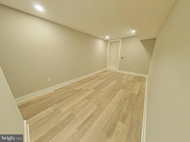 basement with light wood-type flooring