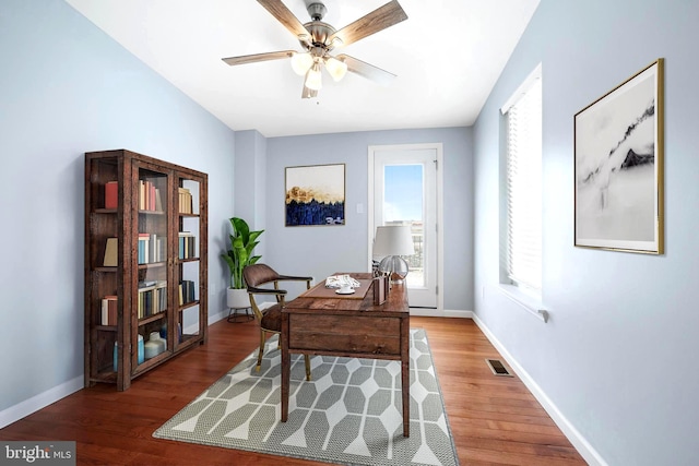 office space featuring hardwood / wood-style flooring and ceiling fan