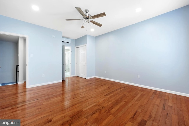 interior space featuring ceiling fan and hardwood / wood-style flooring