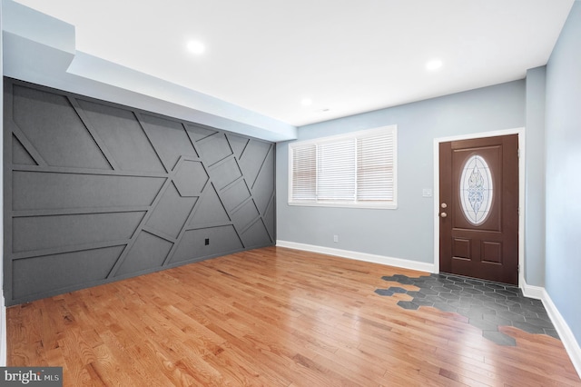 entrance foyer with hardwood / wood-style floors