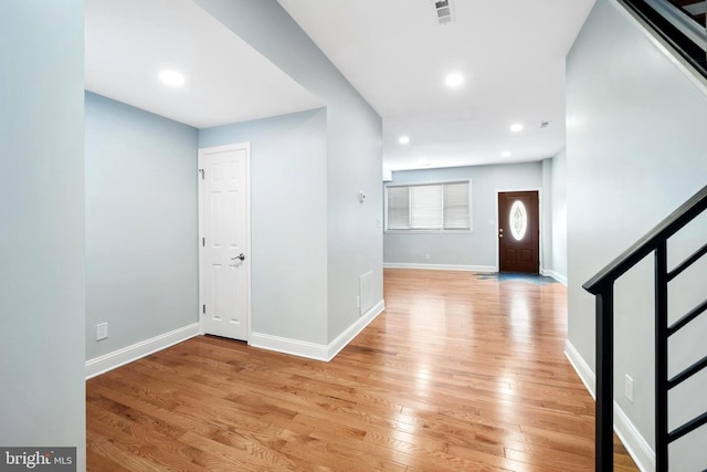 foyer with light hardwood / wood-style flooring