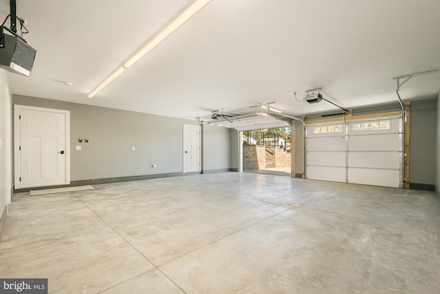 garage featuring a garage door opener