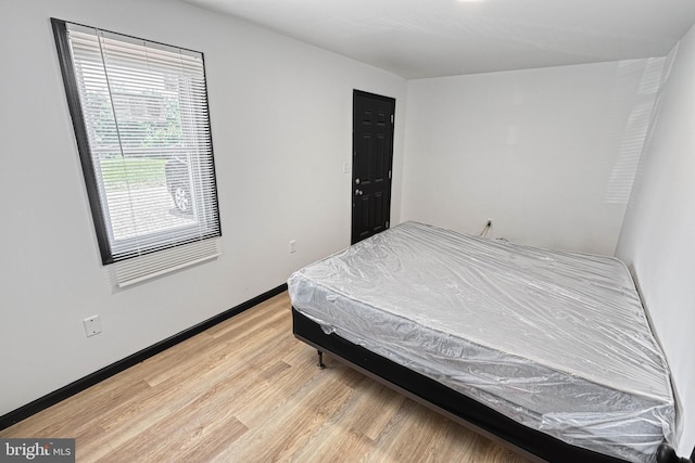 bedroom featuring light hardwood / wood-style floors