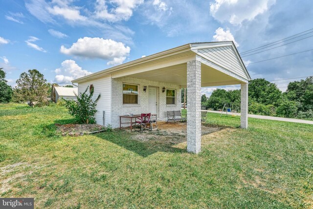 exterior space with a front lawn