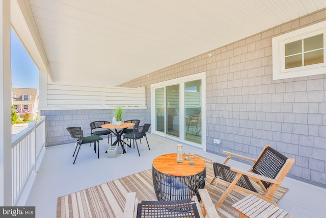 balcony with outdoor dining space