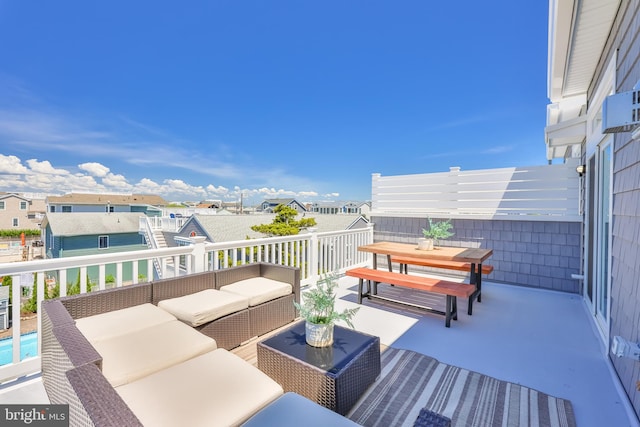 exterior space featuring a residential view and outdoor lounge area