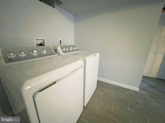 laundry room featuring independent washer and dryer