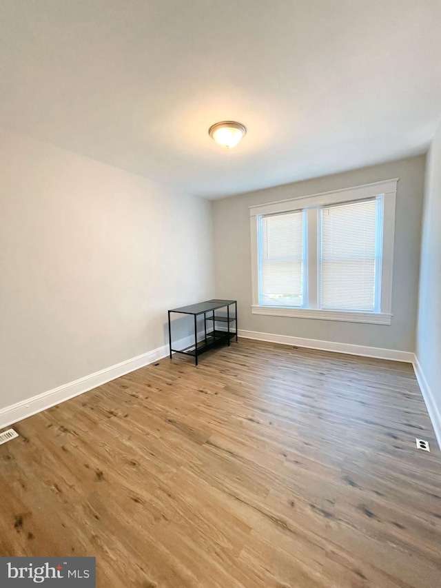 empty room featuring light hardwood / wood-style floors