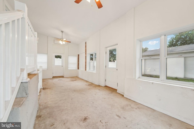 foyer with lofted ceiling and ceiling fan