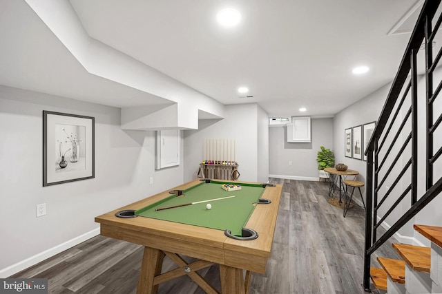 recreation room with hardwood / wood-style flooring and pool table