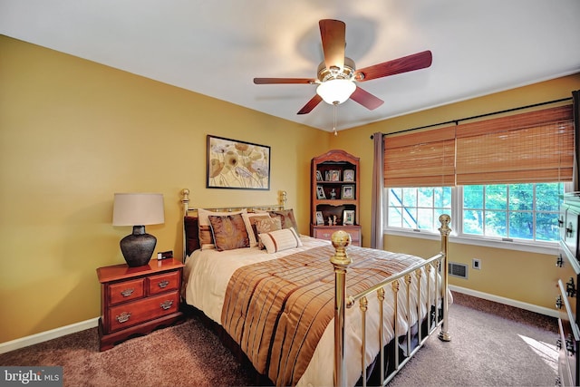 bedroom featuring ceiling fan and carpet floors