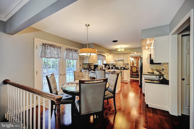 dining area featuring dark hardwood / wood-style flooring