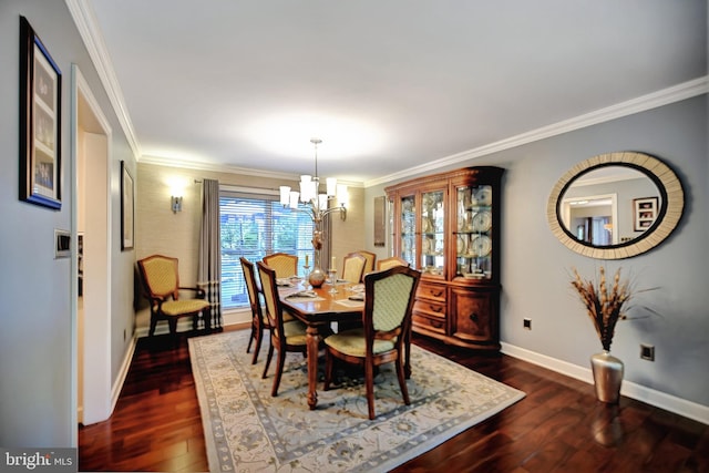 dining area with crown molding, dark hardwood / wood-style flooring, and a chandelier