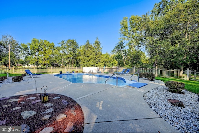 view of pool featuring a patio area