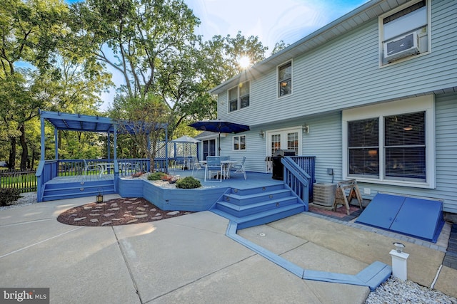 view of patio with a deck and a pergola