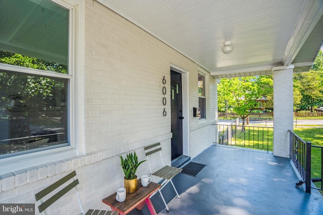 view of patio featuring a porch